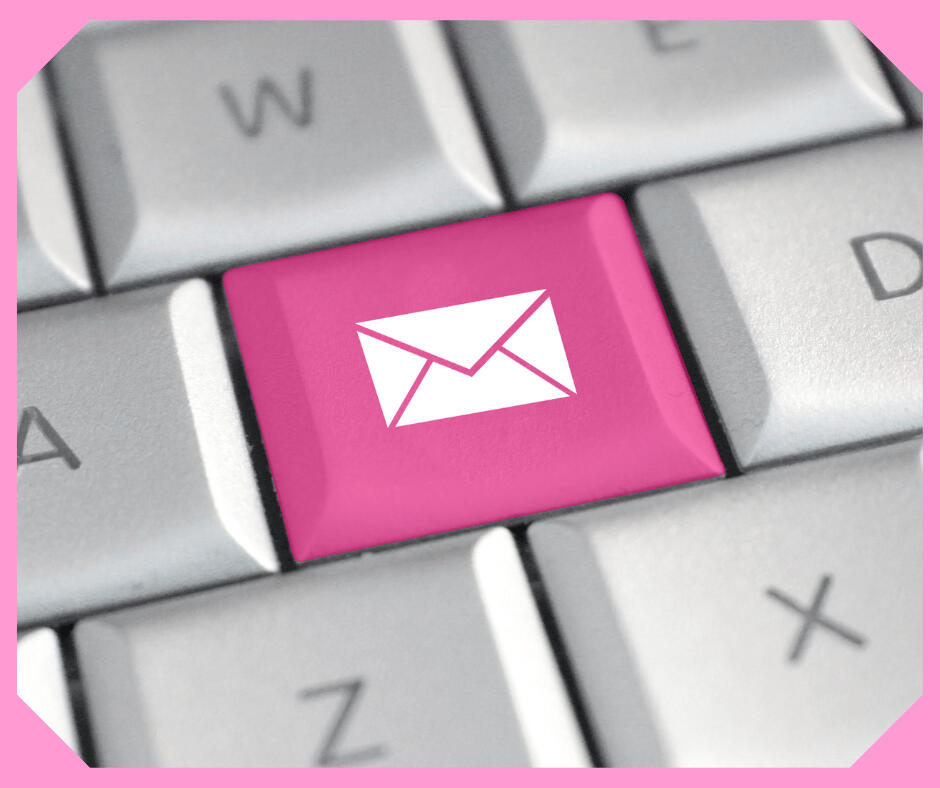 Green key on keyboard with white email letter icon